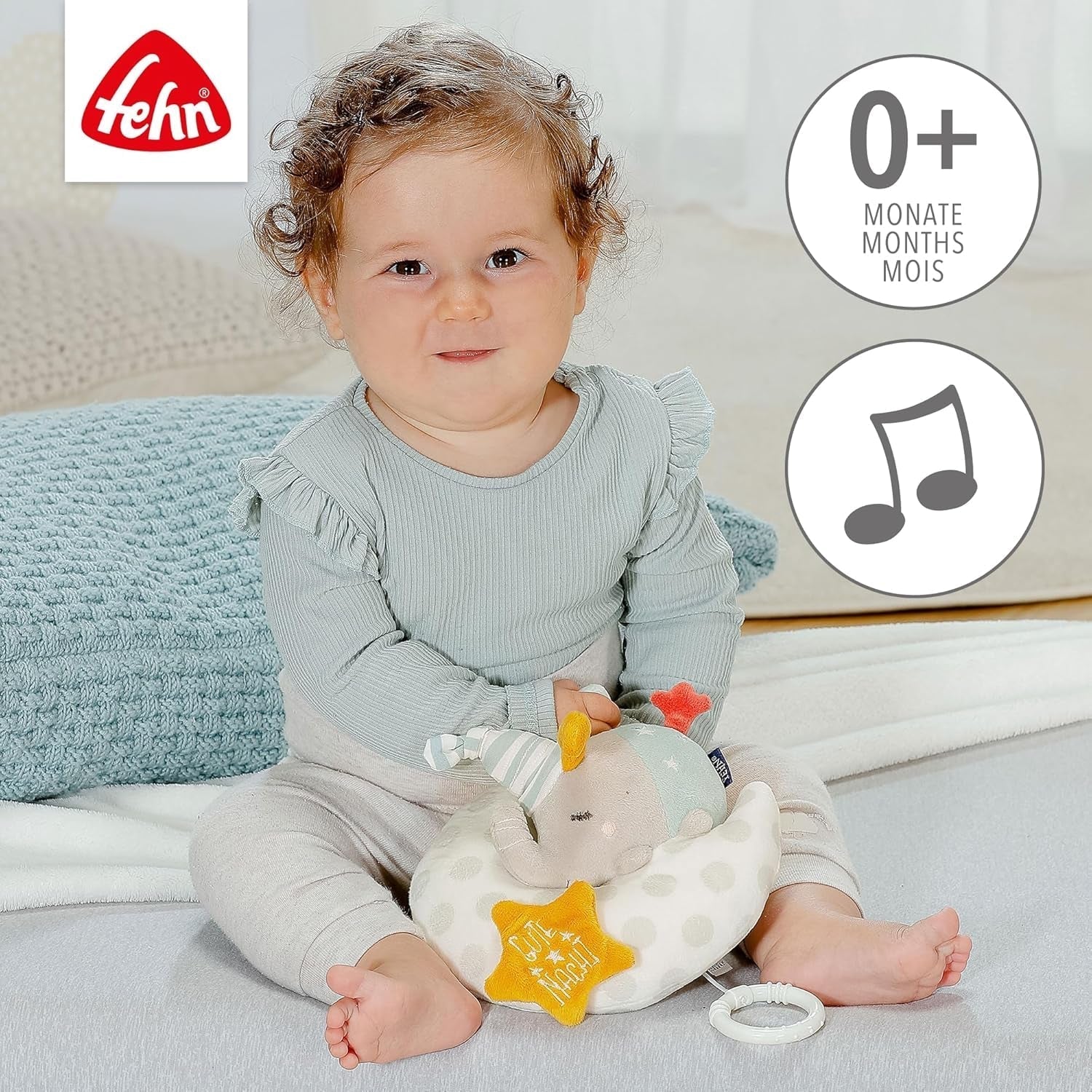 Fehn Spieluhr Elefantenbaby im Mond - Stickerei „Glow-in-the-dark“ mit dem Lied „Der Mond ist aufgegangen“ – Plüschtier zum Einschlafen – Spielzeug für Kinder unterwegs und zu Hause – ab 0+ Monaten Babyspielzeug Naty Shop