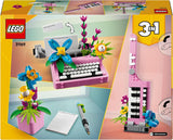 LEGO Creator 3In1 Schreibmaschine mit Blumen – umwandelbares Spielzeug in ein Keytar-Modell oder in einen Blumentopf mit Notizbuch und Stift – Bauset – Geschenk für Mädchen und Jungen ab 8 Jahren 31169 Bausets Besuchen Sie den LEGO-Store