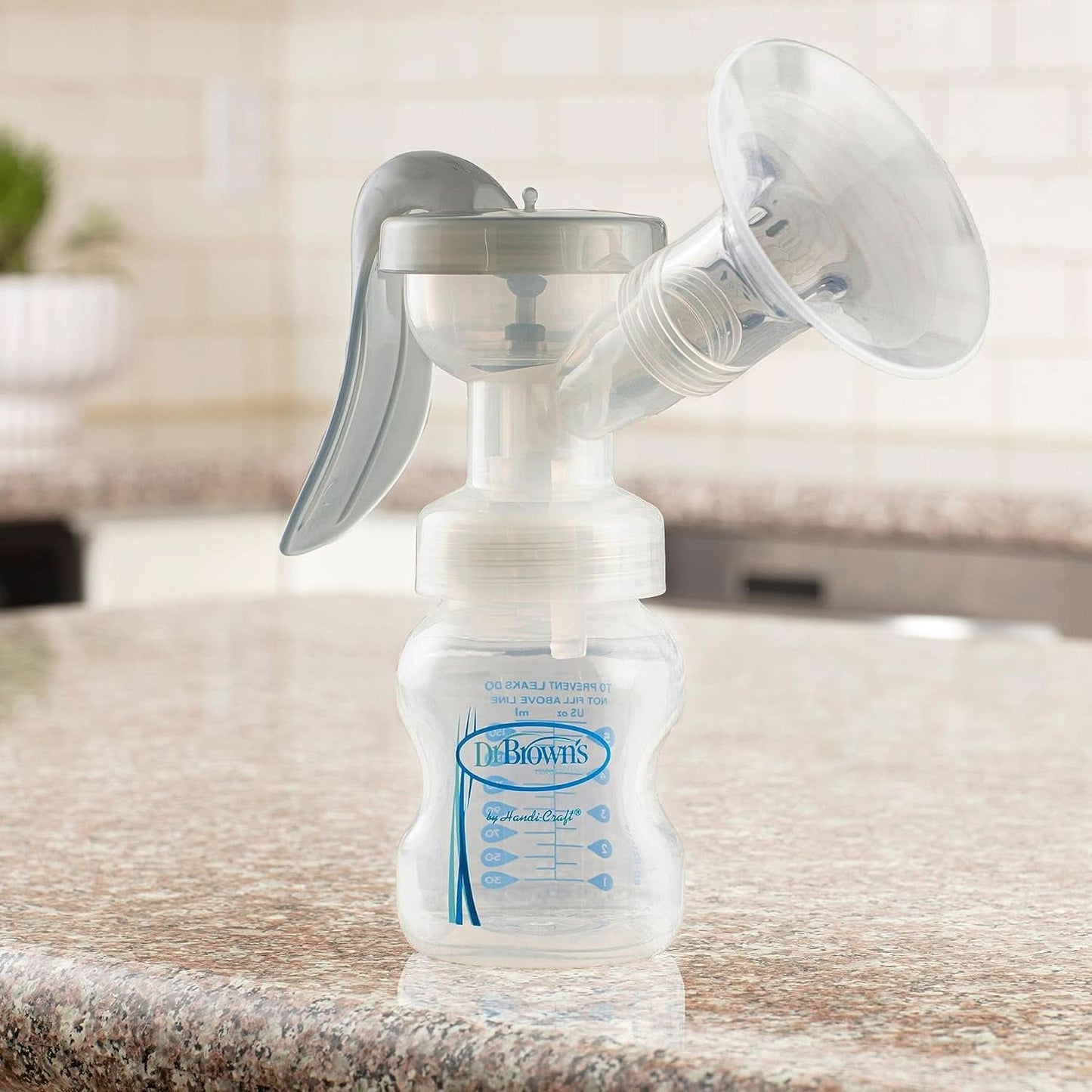 Manuelle Milchpumpe mit Softshape-Schutz aus 100 % Silikon (B, 25-mm-Flansch) und Anti-Kolik-Optionen + 150-ml-Weithalsflasche mit langsam fließendem Sauger der Stufe 1 Zubehör Essen und Stillen Bebe Naty Shop