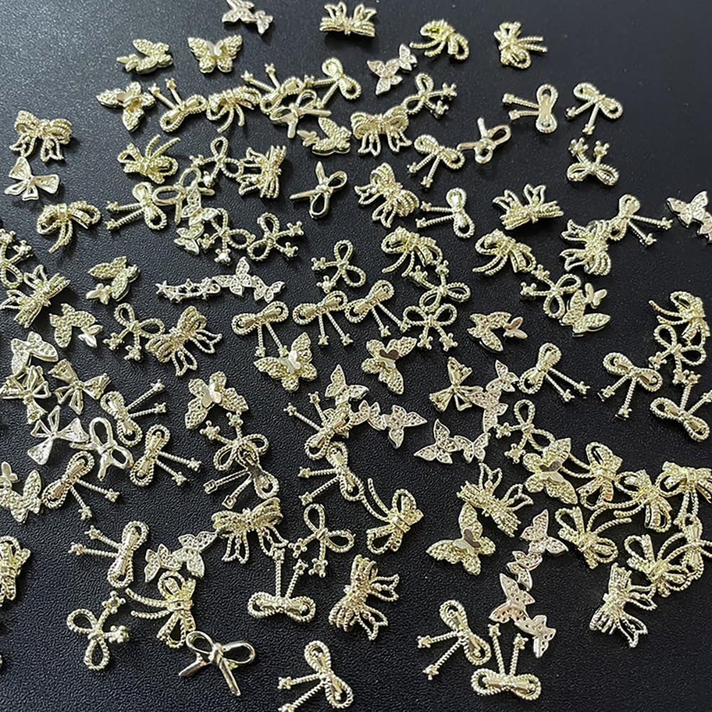 50 Stück 3D Gold Bow Nail Charms Butterfly Nail Art Charms Legierung Bogen Nagel Charms Nägel Zubehör Schleife Nagelschmuck Metall Schleifen Schmetterling Nageldesign Nagelanhänger Nailart Strasssteine