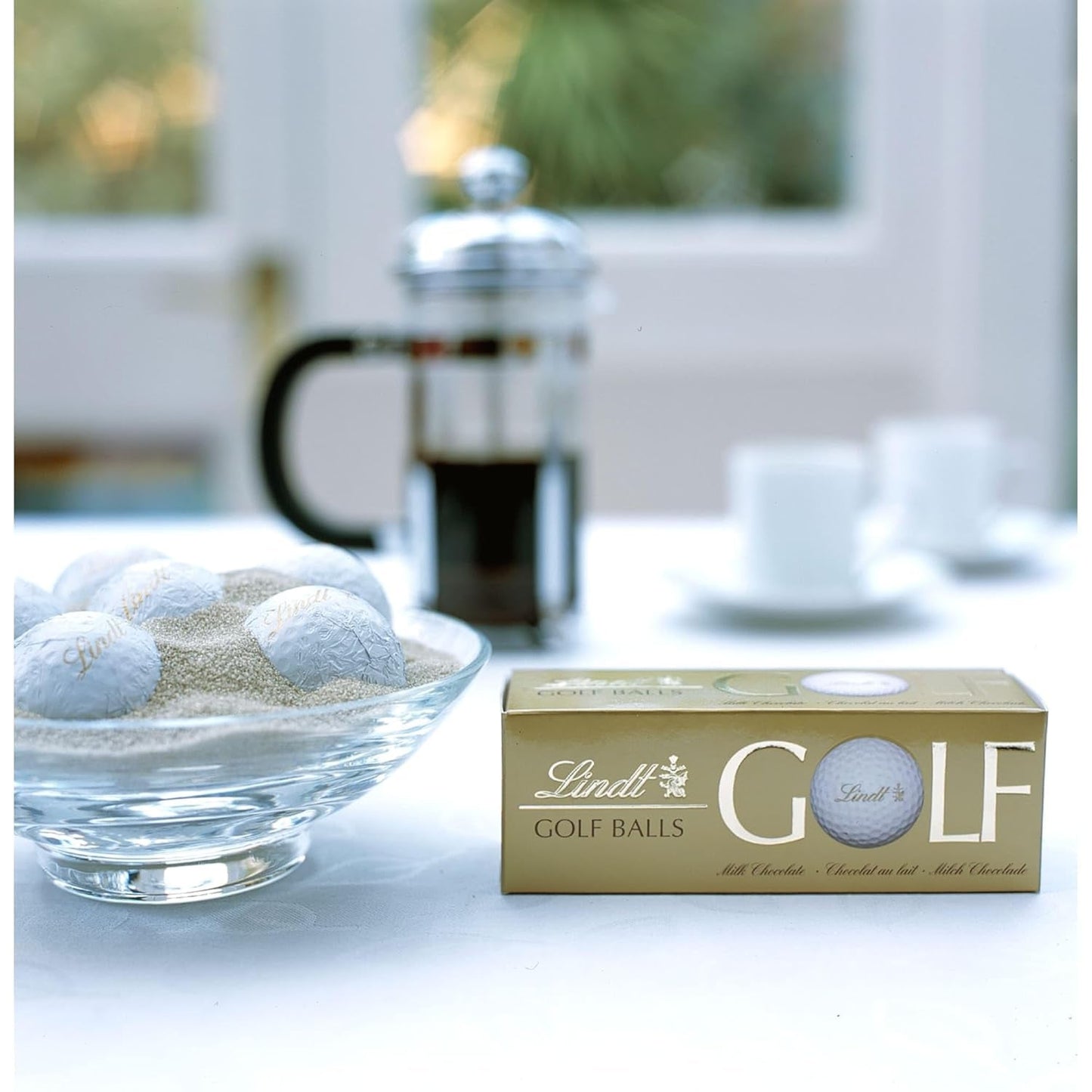 Lindt Schokolade - Golfbälle | 110 G| Drei Golfbälle Aus Lindt Vollmilch-Schokolade Mit Nougatcremefüllung Und Waffelstückchen | Pralinengeschenk | Geschenk für Golfer | Schokoladengeschenk Naty Shop
