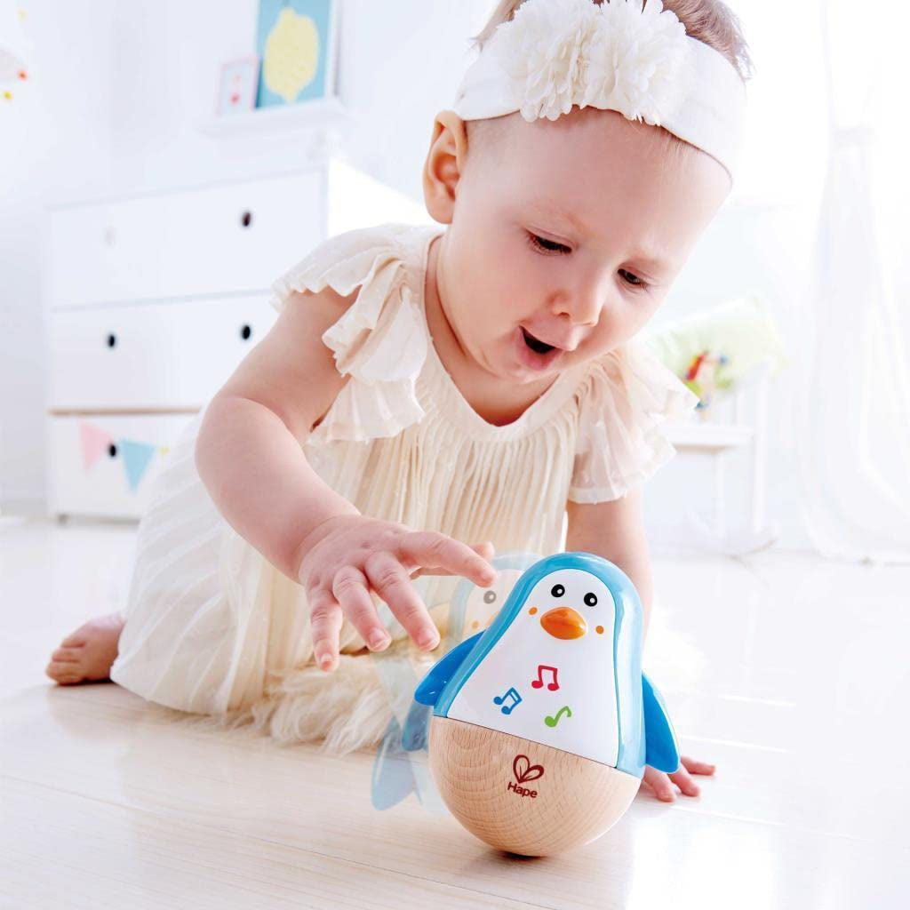 Baby Einstein Magic Touch Musikspielzeug mit Holztrommel für 6 Monate und älter & Hape Pinguin Musikalischer Wobbler, bunte Wackelmelodie, Roly-Poly-Spielzeug für 6 Monate und älter Bebe Toys Naty Shop