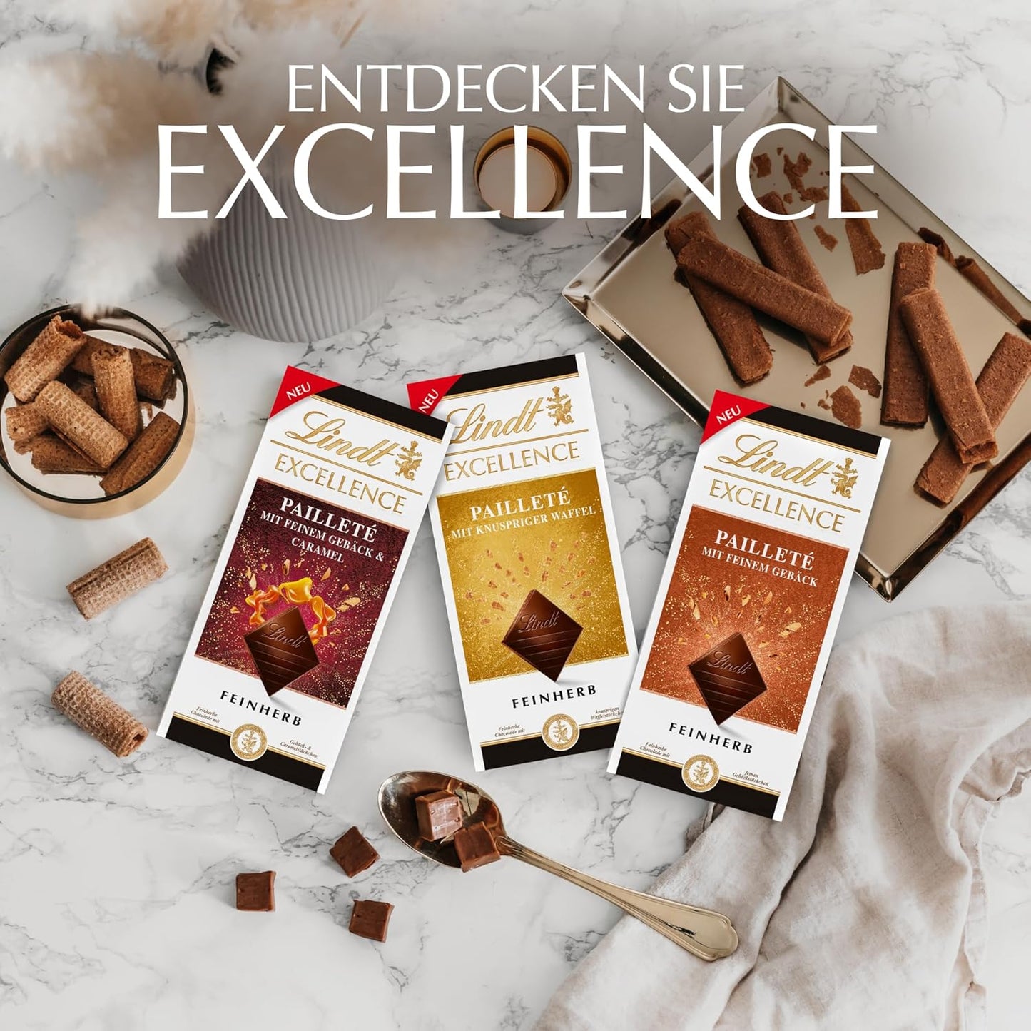 Lindt EXCELLENCE Teigstücke mit Pailletten und Karamell – Feine dunkle Schokolade mit intensivem Kakaogeschmack