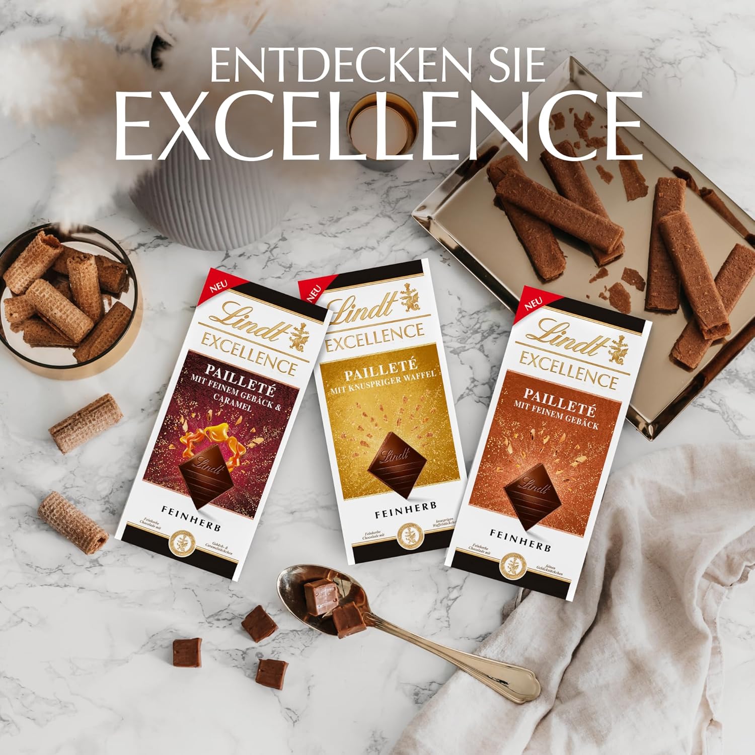 Lindt EXCELLENCE Teigstücke mit Pailletten und Karamell – Feine dunkle Schokolade mit intensivem Kakaogeschmack