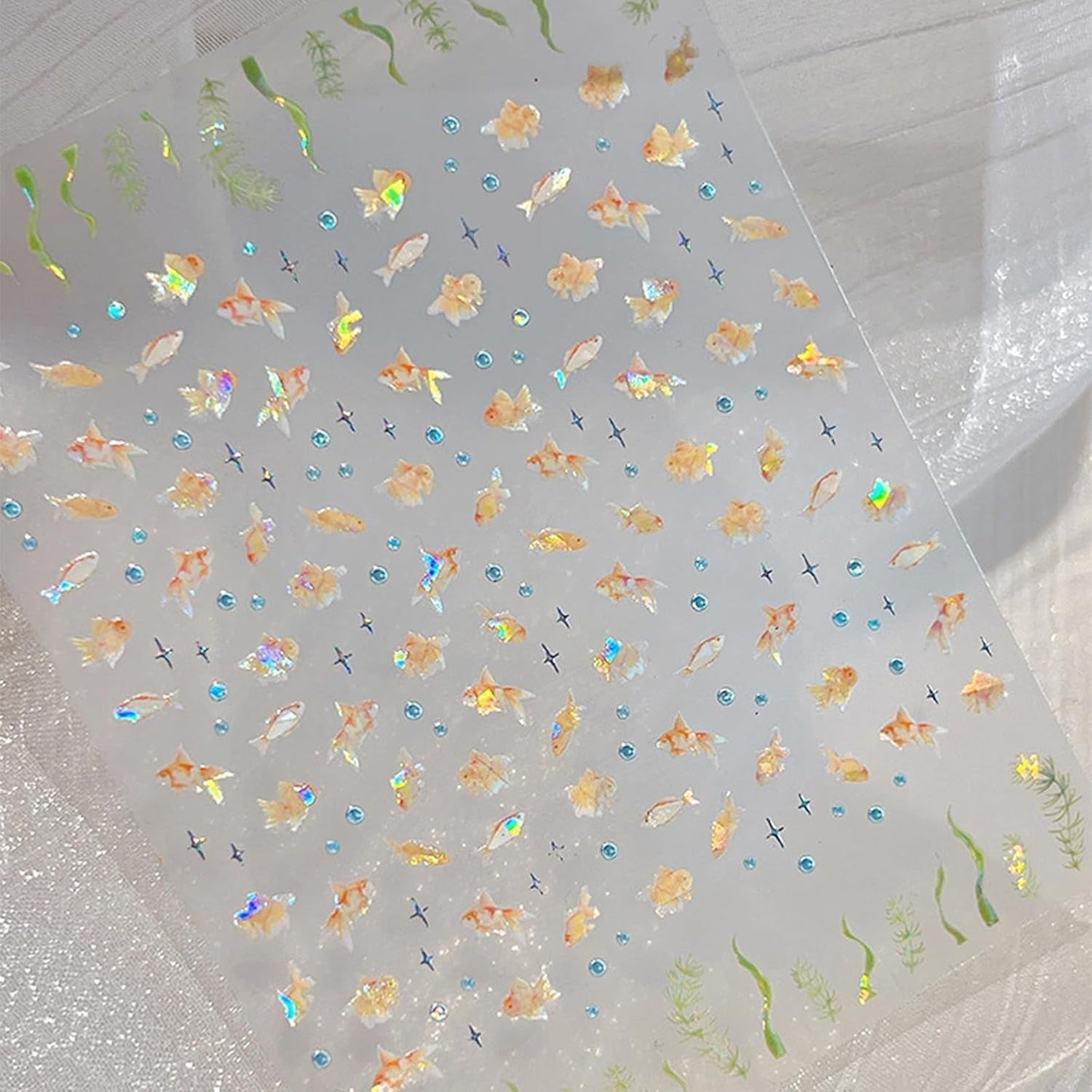 2 Stück selbstklebende Nagelsticker mit Muscheleffekt, Vierstrahlstern und Goldfisch-Design, Nagelaufkleber für Fingernägel, Nail Art Zubehör für Gelnägel