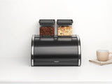 Brabantia Brötchen-Brotbox – Kompakte Aufsatz-Aufbewahrungsbox für Brot, Bagels und Brötchen mit flachem Deckel, robuster Stahl – mittelgroß – mattschwarz. Lebensmittel-Aufbewahrungsboxen Naty Shop