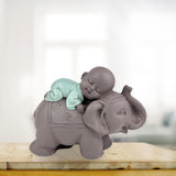Zen'Light-Statue Buddha Bonze, der auf einem Elefanten schläft – Zen-Atmosphäre in Ihrem heiligen Raum – wunderschöne glückverheißende Figur – H 9,5 cm, braun und grün. Statuetten und Skulpturen von Naty Shop